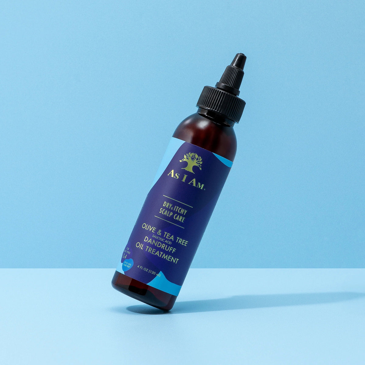 Bottle of As I Am Dry & Itchy Scalp Care Dandruff Oil Treatment with olive oil and tea tree oil to relieve dry, itchy scalp and dandruff.