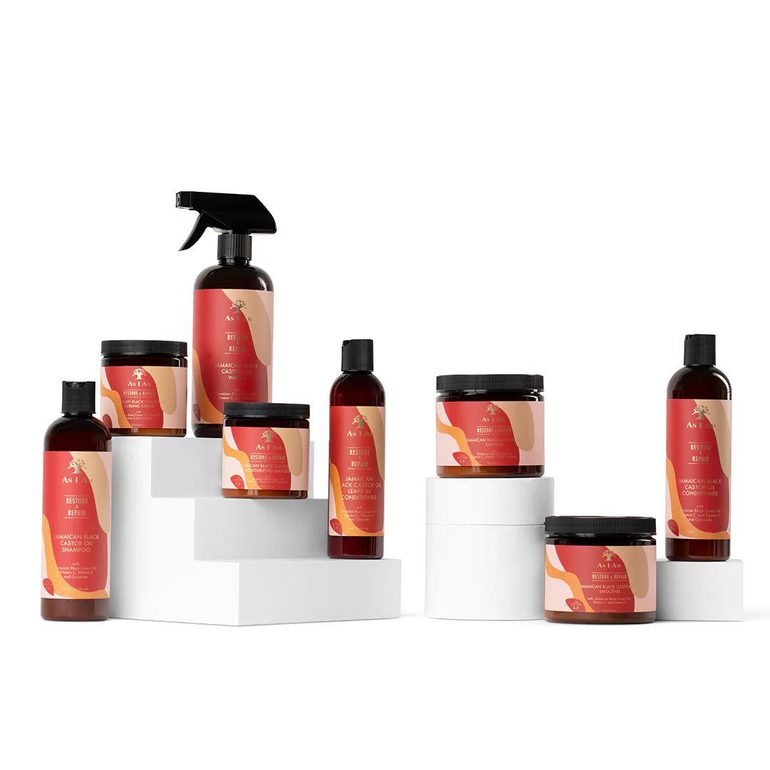 A collection of hair care products from the As I Am Jamaican Black Castor Oil range, including bottles and containers.