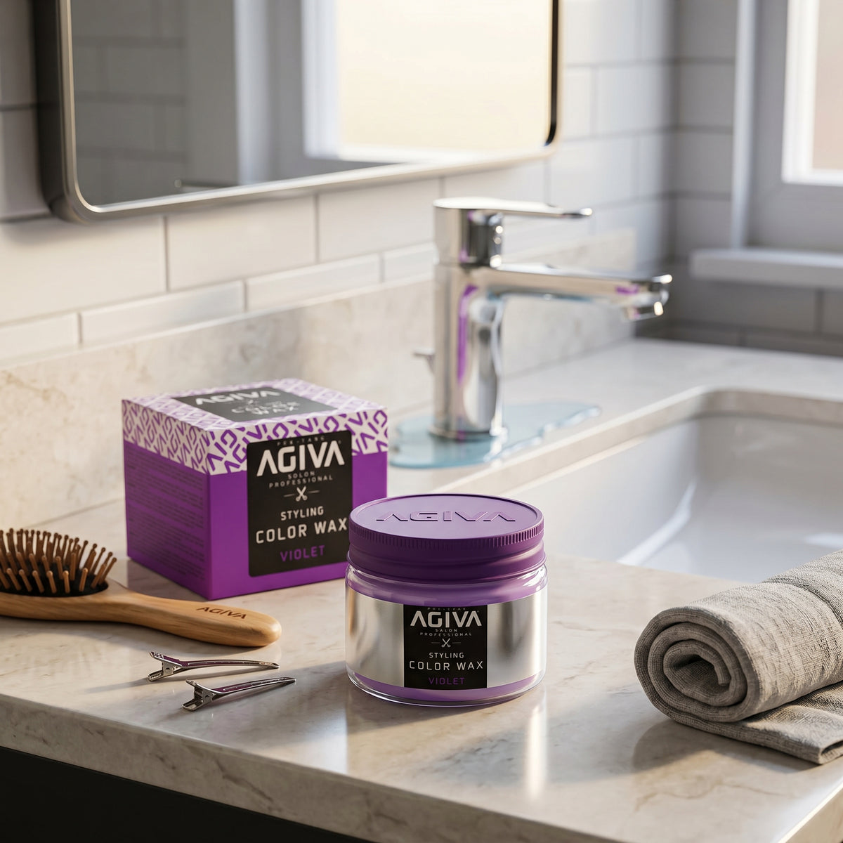 AGIVA Styling Color Wax Violet in purple jar on bathroom table with hair brush and hair clips.