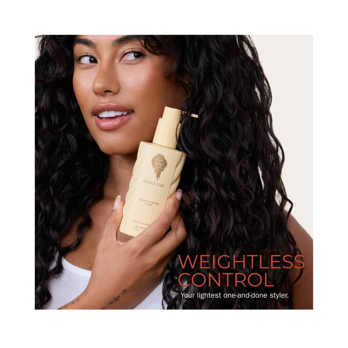 Bounce Curl Hydra Lite Styling Cream in creamy white pump bottle with gold logo and Volumix Bio-Actives, 237 ml light moisturizing styling cream.