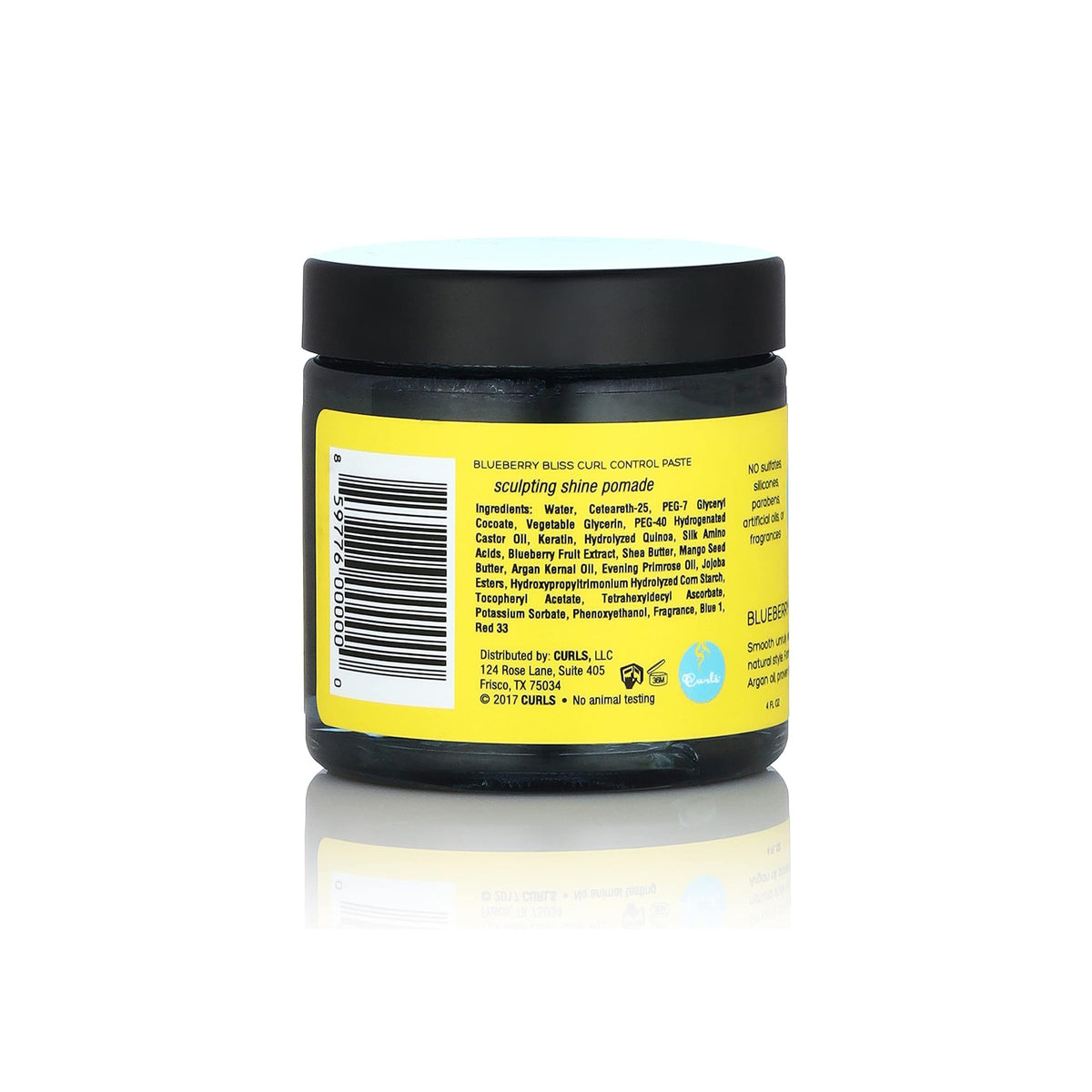 Close-up of the back of Curls Blueberry Bliss Curl Control Paste showing ingredients and product information.