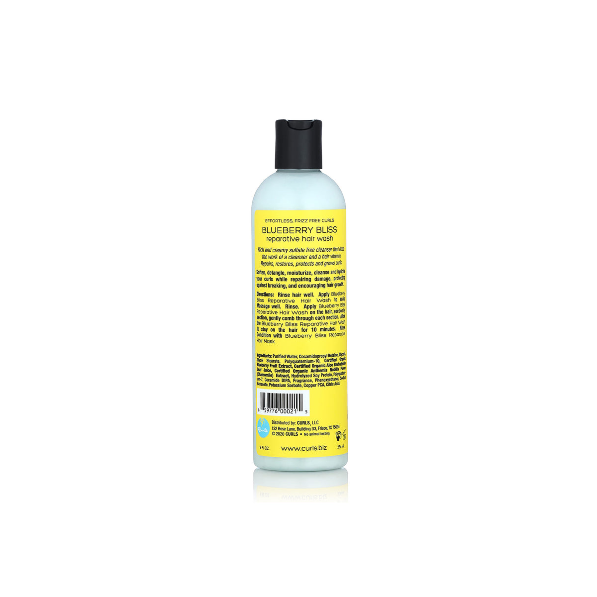 Reparative hair wash Curls Blueberry Bliss in a light blue bottle with a black lid and a yellow label describing the product's ingredients and properties.