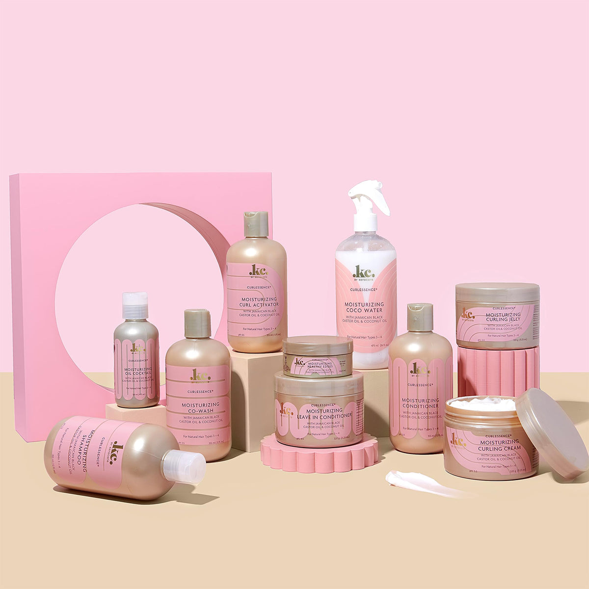 Image of the KeraCare Curlessence range, including shampoo, conditioner, co-wash, curl activator, curling jelly, curling cream and leave-in conditioner.