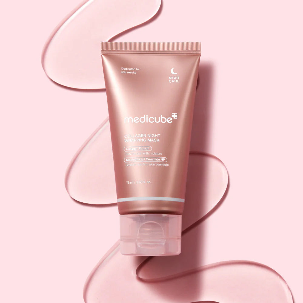 Medicube Collagen Night Wrapping Mask 75ml in pink tube lies on a light pink background with spread jelly around.
