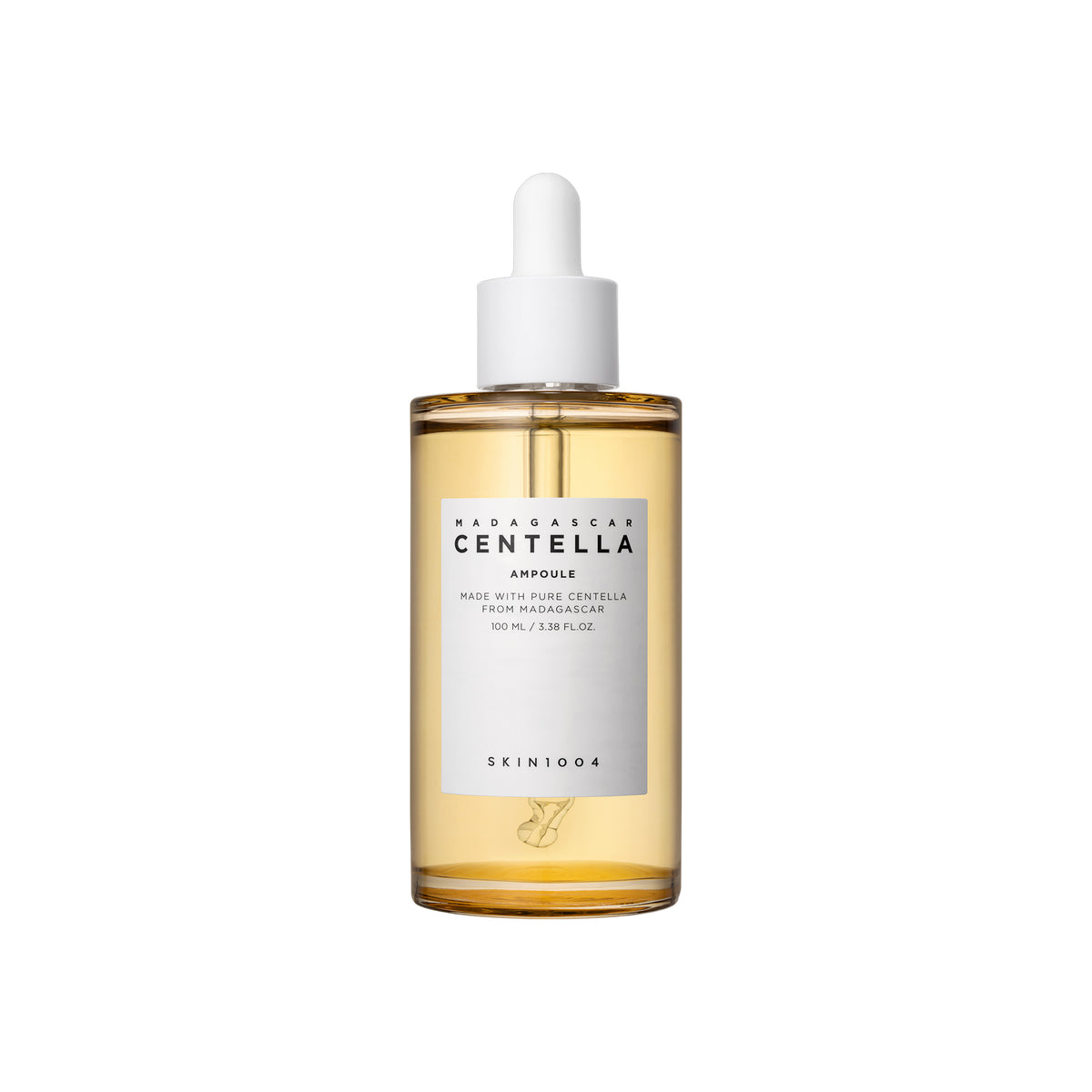 SKIN1004 Madagascar Centella Ampoule 100ml in transparent glass bottle with pipette and golden serum.