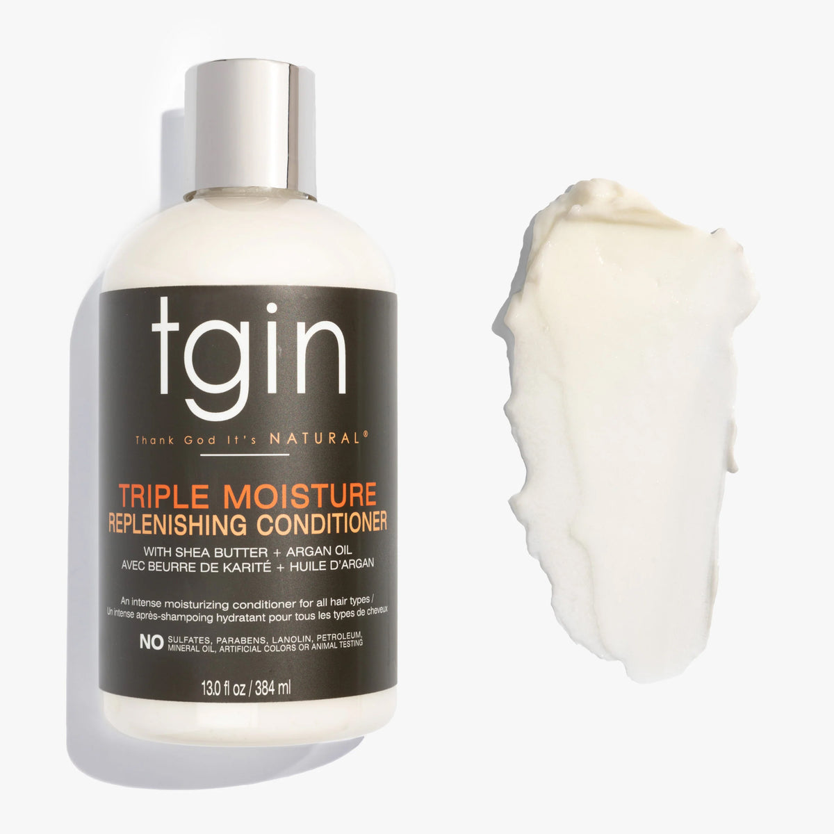 TGIN Triple Moisture Replenishing Conditioner 384ml with creamy consistency shown next to bottle on white background.